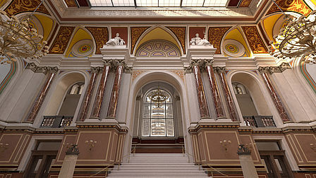 Blick aus der prächtigen Eingangshalle des Anhalter Bahnhof in Richtung der Treppe zum Querbahnsteig. Neben den Treppen befinden sich Säulen aus rotbuntem Stuckmarmor, auf denen Personifikationen von „Wissenschaft“ und „Industrie“ angebracht sind.