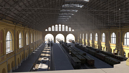 Ein Blick von der Galerie in die Bahnhofshalle in Richtung Südportal. Auf den Gleisen stehen historische Züge.