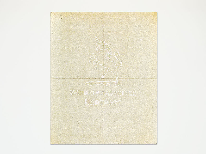 Ein weißes Blatt Papier, das als Wasserzeichen ein Einhorn trägt.