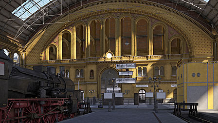 Blick vom mittleren Bahnsteig in Richtung des Querbahnsteigs. Der große Bogen der Dachkonstruktion überspannt die Halle. Auf der linken Seite steht eine historische Dampflok.